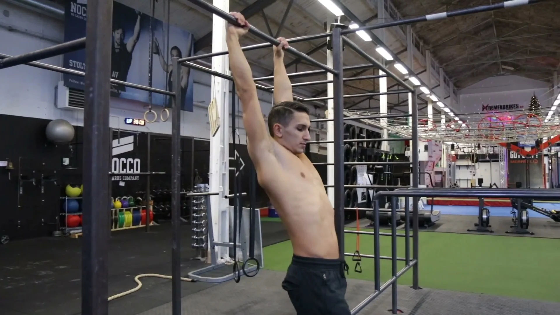 Setting up the power button position by walking forward from the bar to find the correct swing distance for dynamic muscle up