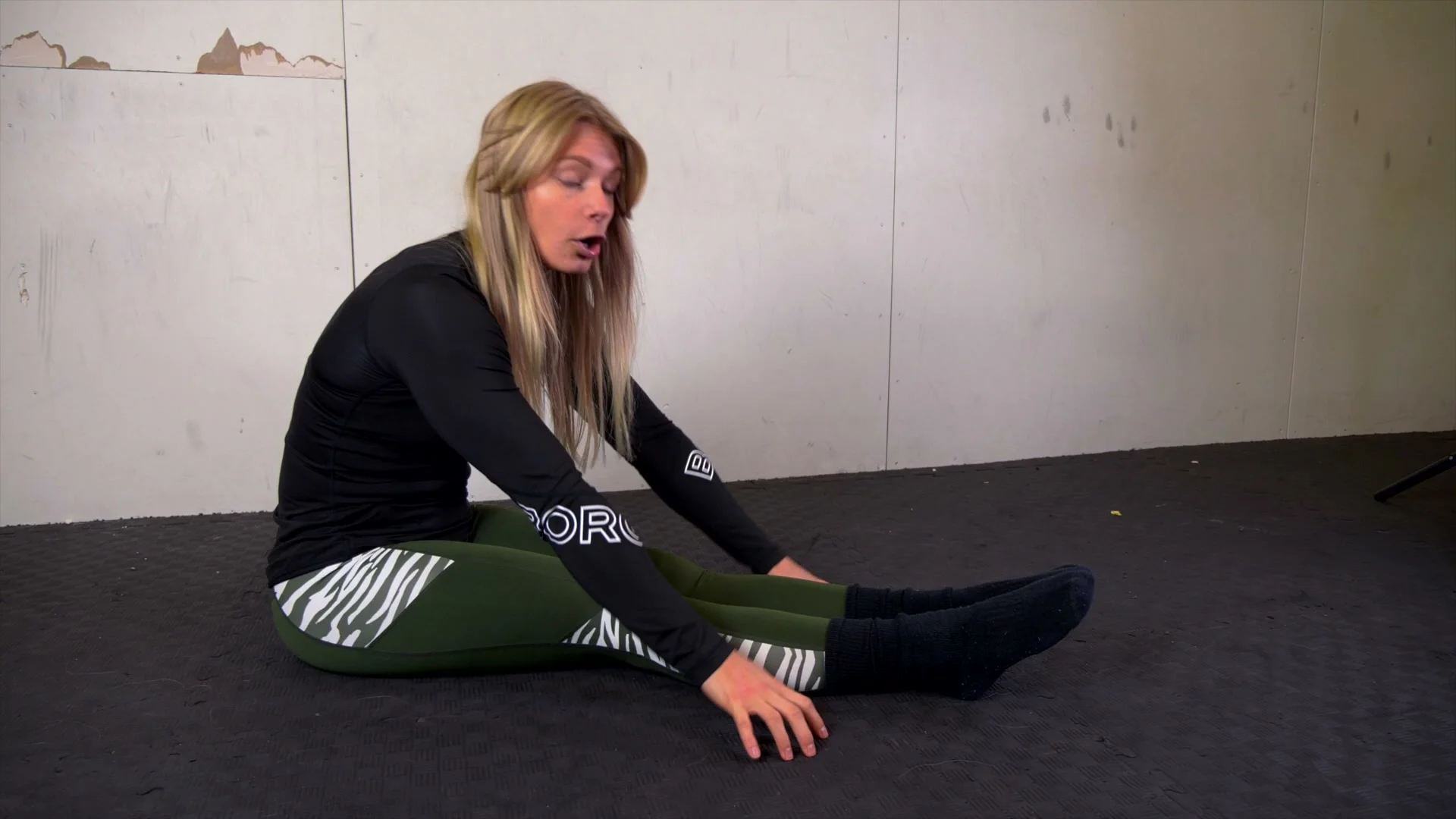Compression lifts for V-sit: sitting with straight legs, hands palms down near knees, lifting legs while keeping upper body still and belly sucked in